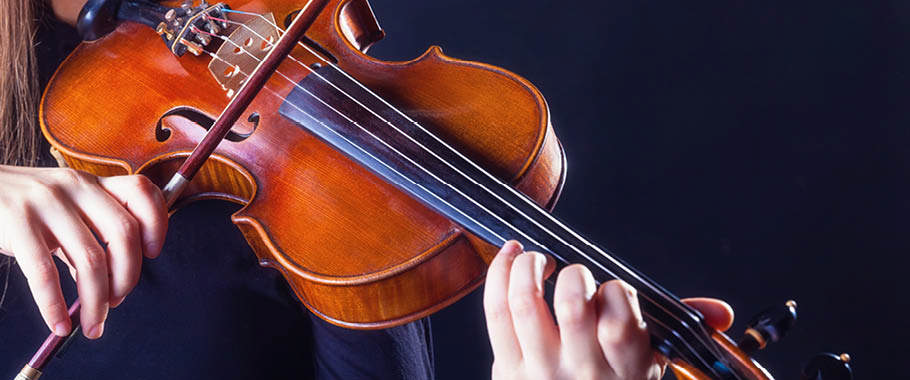 Billede af violin og noder Billede af violin og noder